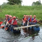 key stage 3 students in a raft