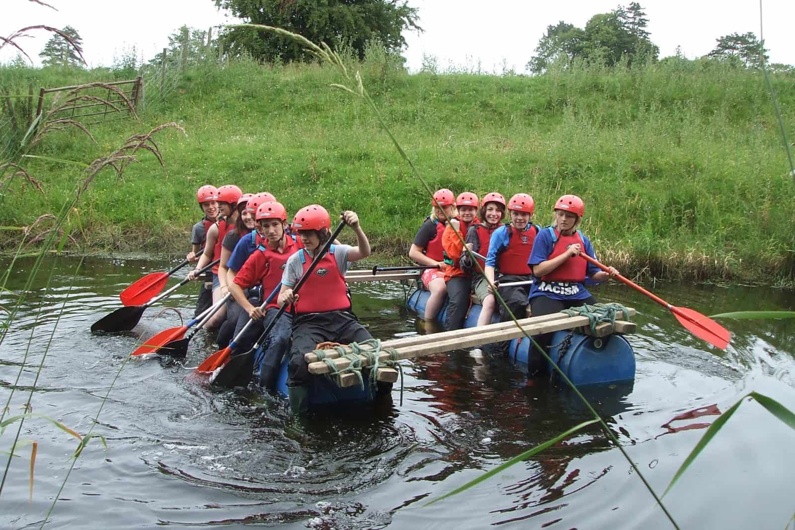 key stage 3 students in a raft