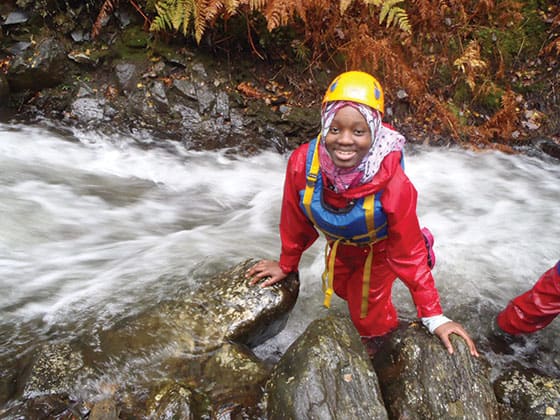 Primary school girl canyoning