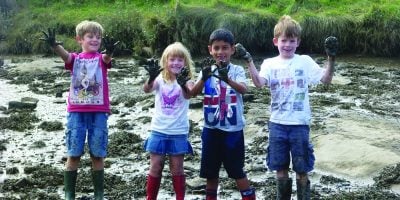 children in mud