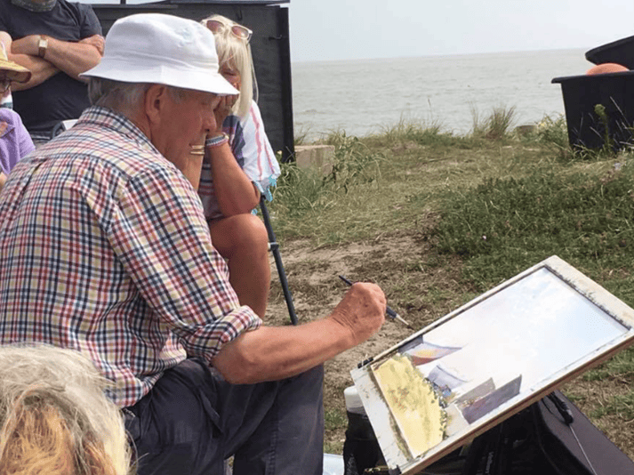 Artist Andrew Pitt demonstrating in watercolour