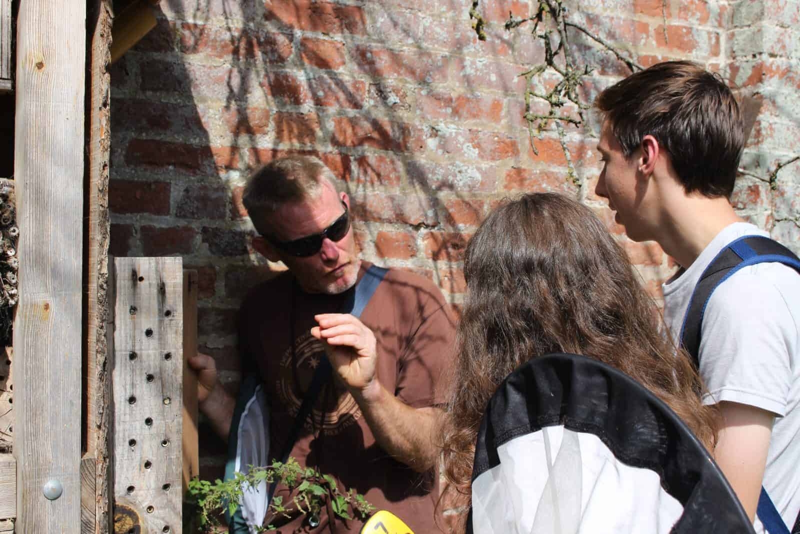 Ian Cheeseborough teaching Young Darwin Scholars about bees