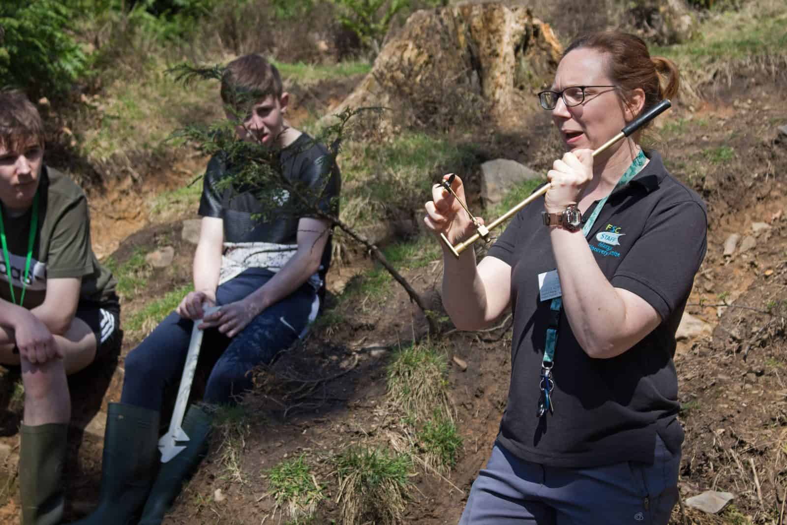 An FSC Tecaher teaching GCSE Geography in the field