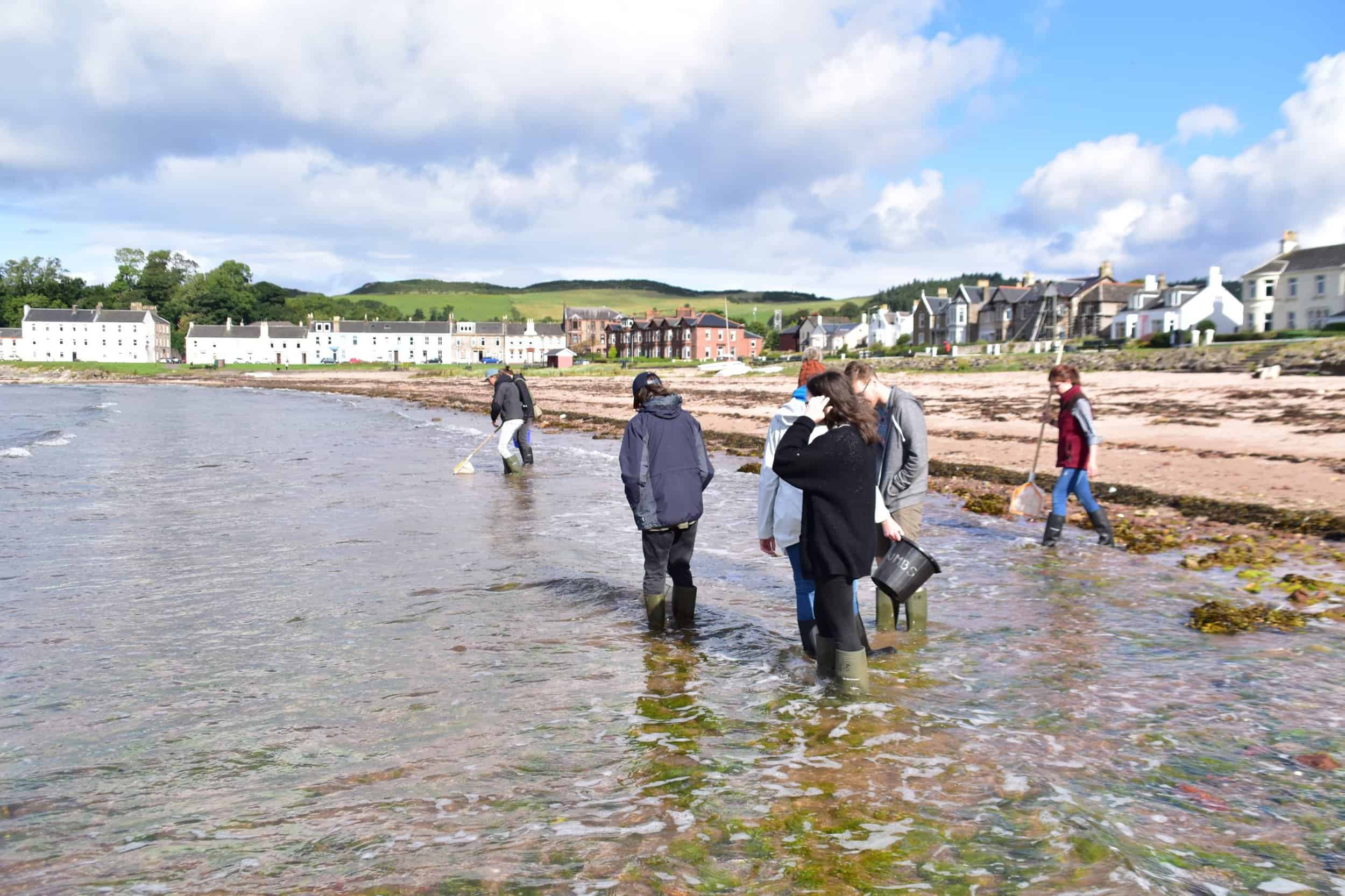 Sea cleaning at Millport Beach