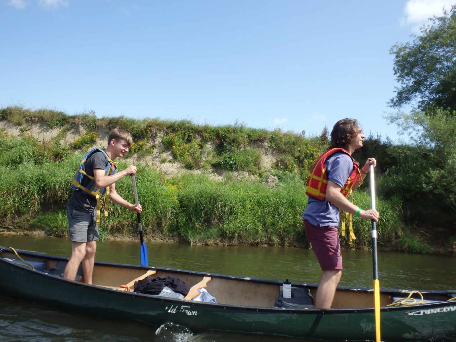 Growing Confidence members in canoe