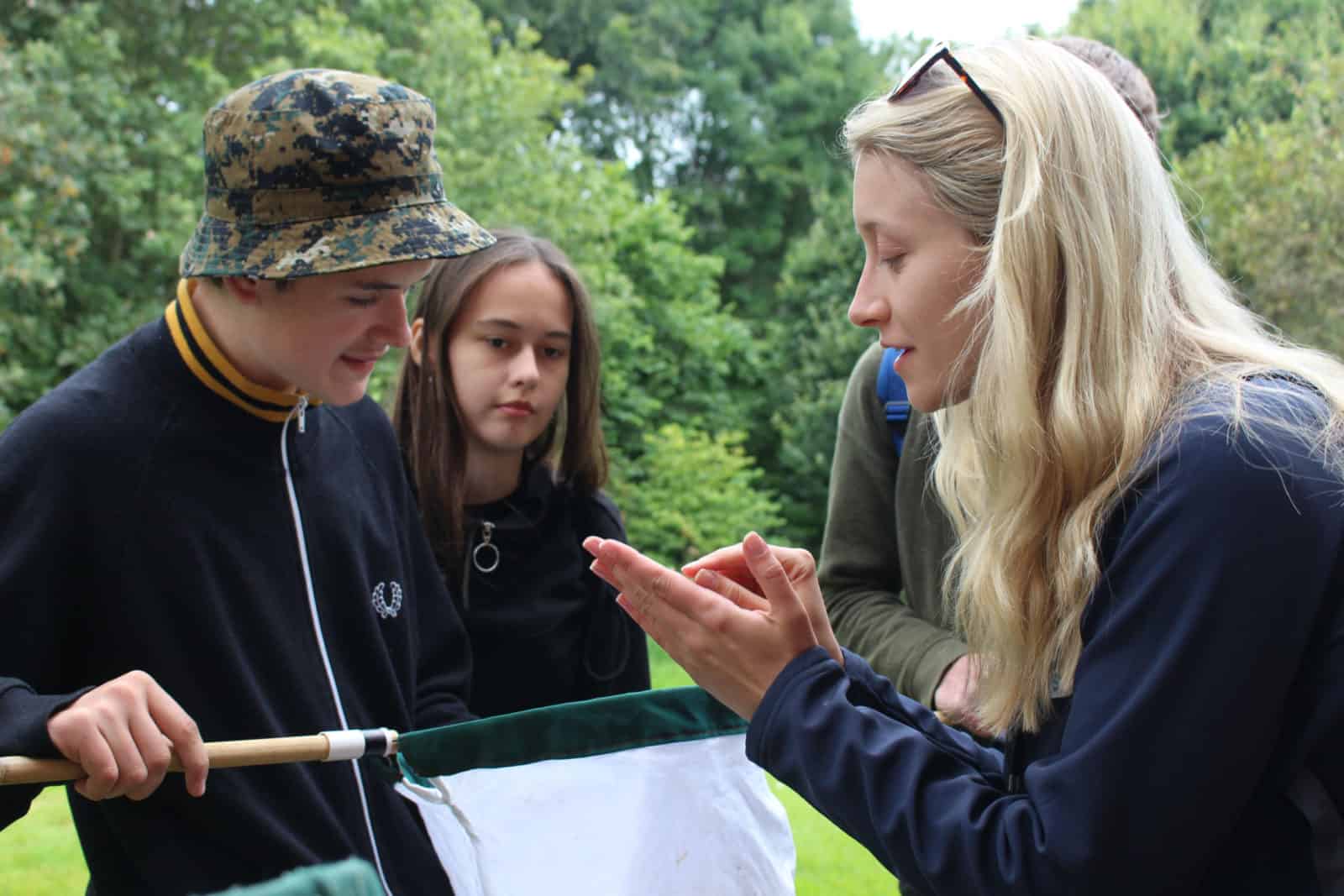 Young Darwin Scholars identifying insects with Holly Dillon