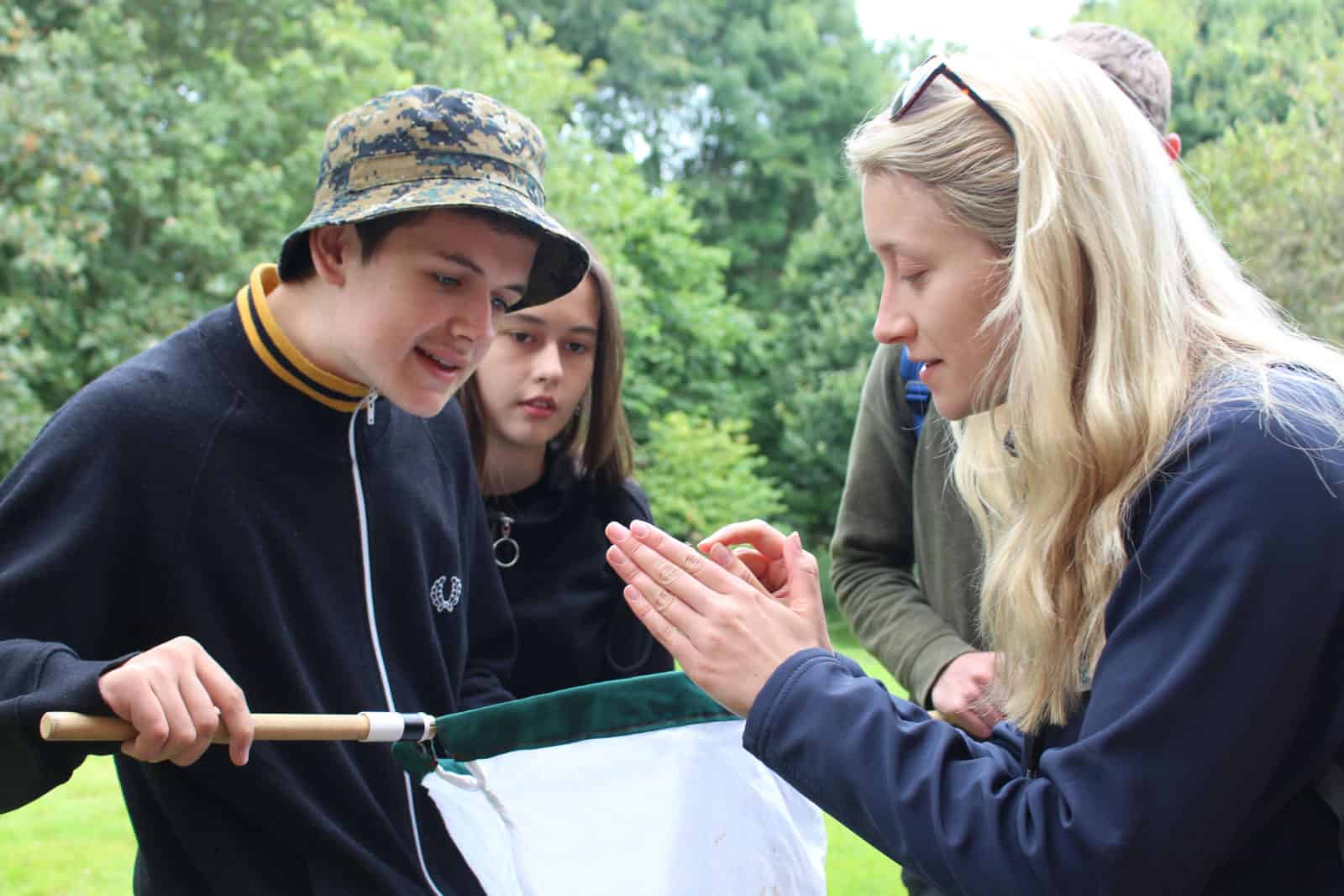 Young Darwin Scholars identifying insects with Holly Dillon