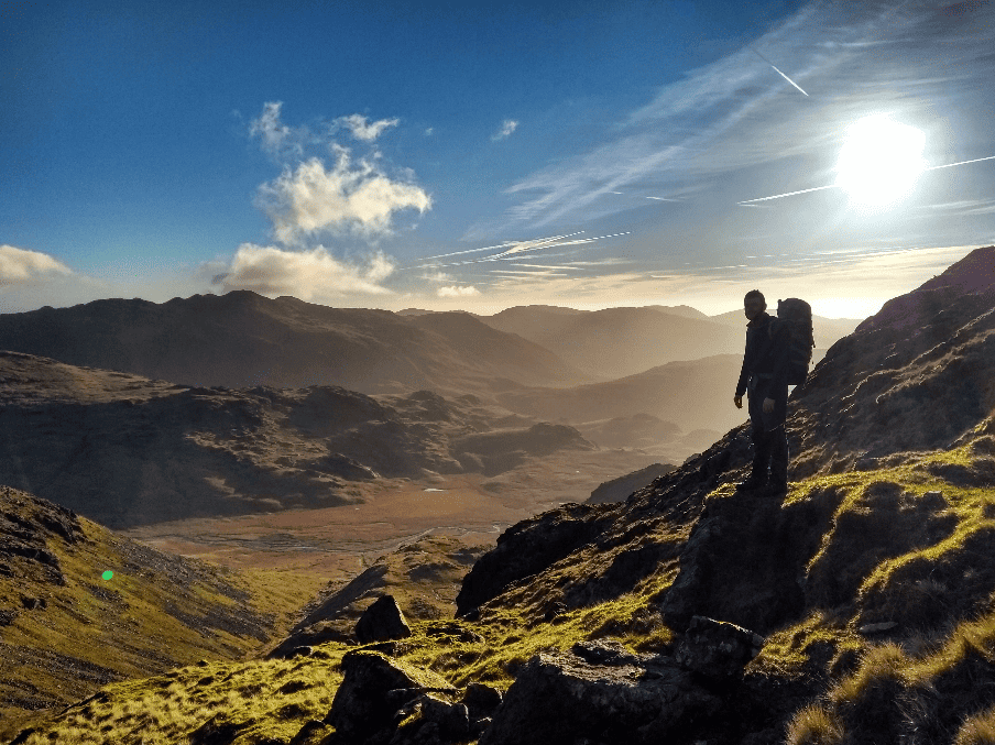 Man walking in the hills