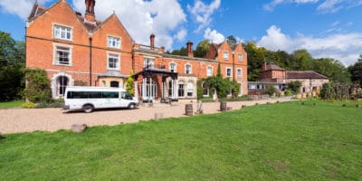 The front of FSC Juniper Hall with minibus