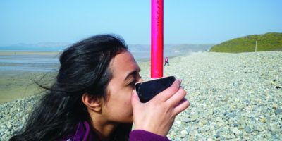 girl working on beach