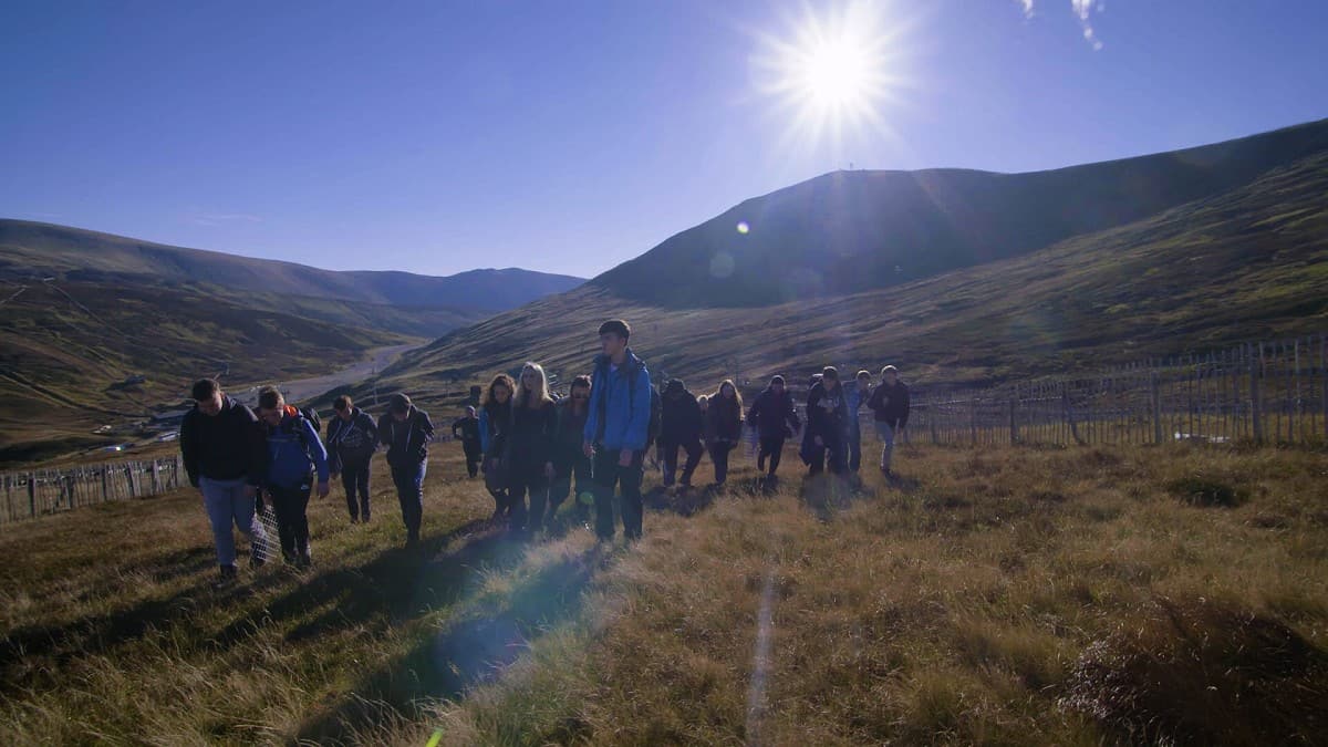 group of students in hills