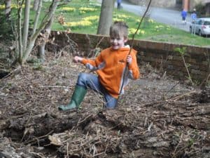 Boy in wooded area