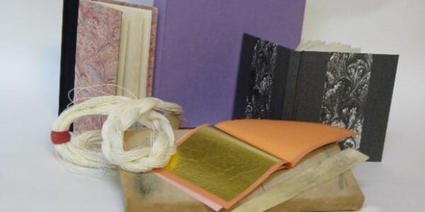 A display of books made on the FSC bookbinding course