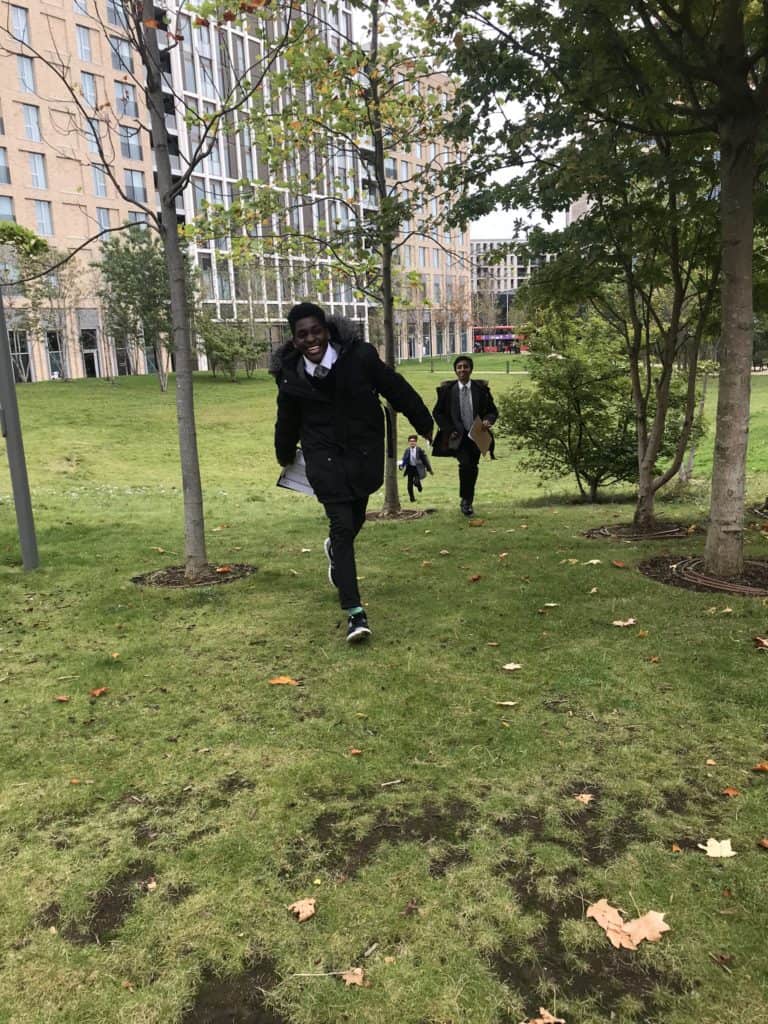 boys running in school grounds
