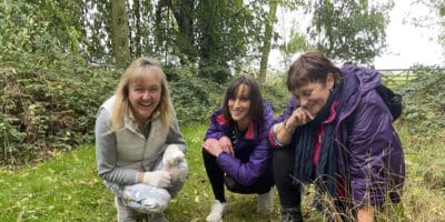 Women foraging in fungi fields