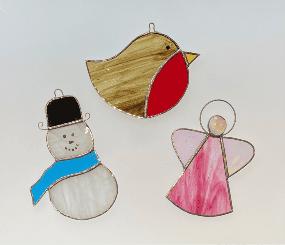 Three glass christmas decorations