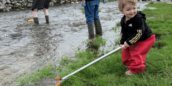 young child pond dipping
