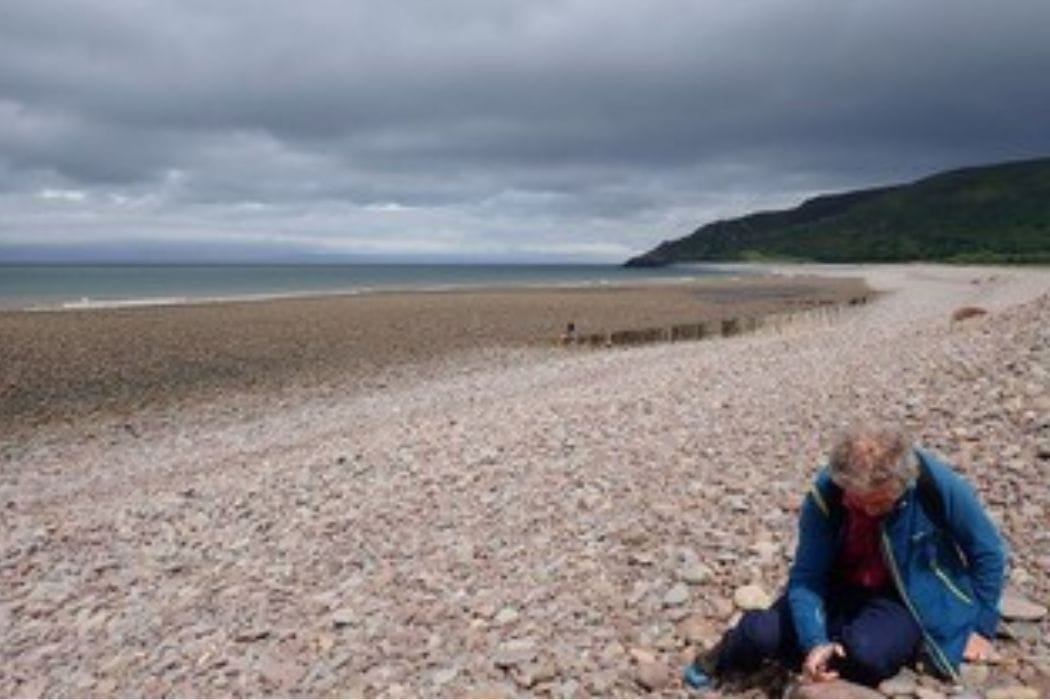 looking at rocks on a somerset beach