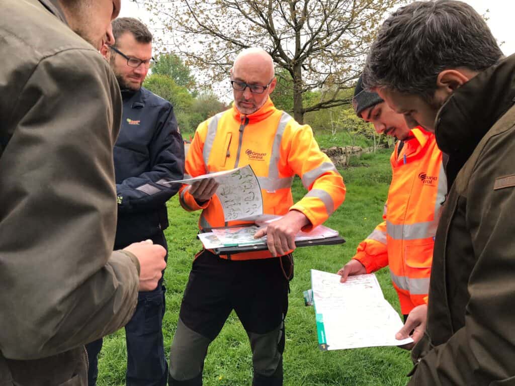 Ground Control participants learning about site surveys and plant identification.