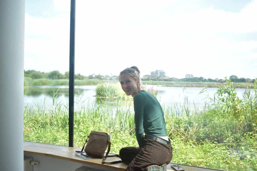 smiling girl by the water