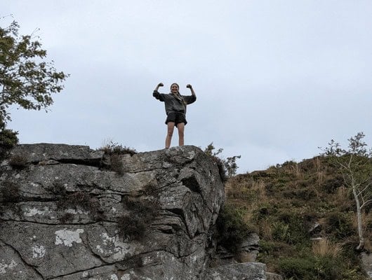 A picture of a women doing a bicep pose