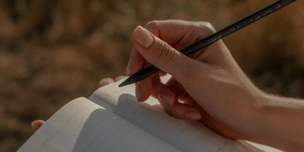 A photo of someone writing - creative writing