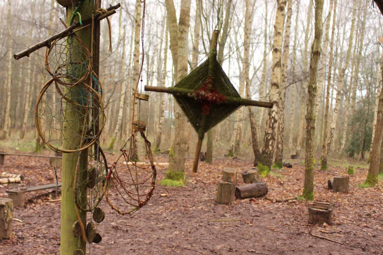 An example of a decoration made in forest school, hanging from a tree in the woods