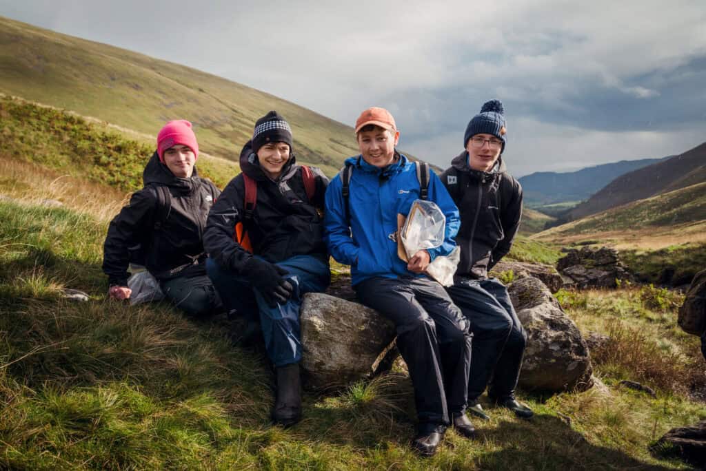 group of boys with Lake District scenery