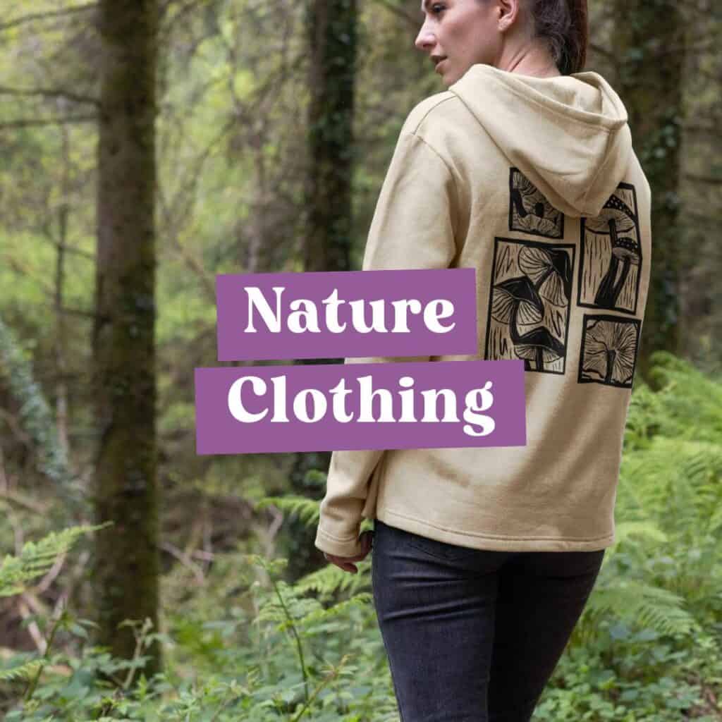 Nature clothing promotional image. Photo of woman wearing fungi print hoodie.