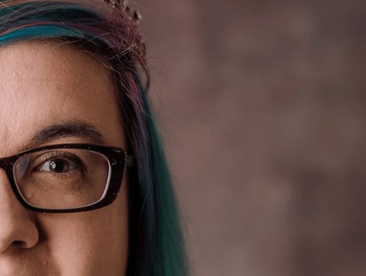 A close up photo of a womens face