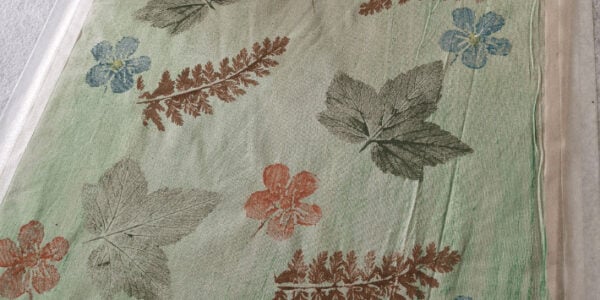 a picture of leaf prints on fabric