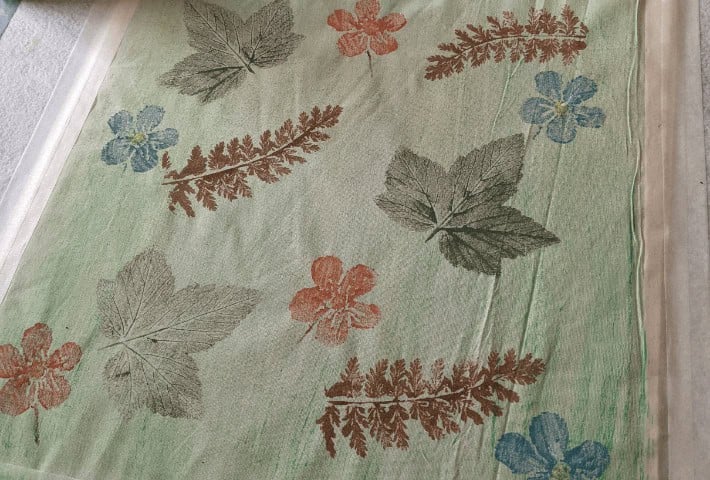 a picture of leaf prints on fabric