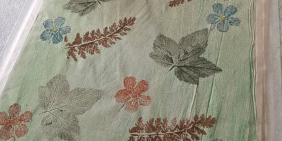 A picture of leaf prints on fabric