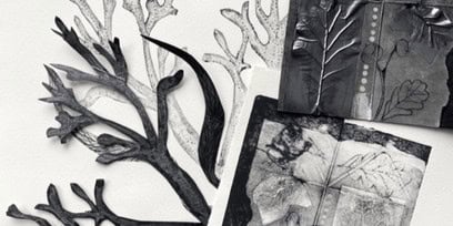 A branch in paint, printing on a piece of paper