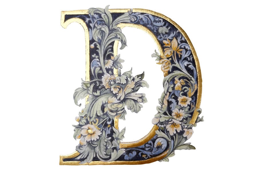 An image of a D made from gold leaf and illustrations - medieval lettering