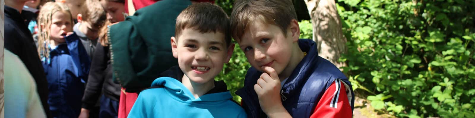 smiling boys in the outdoors