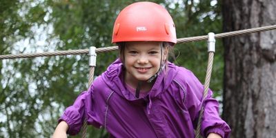 smiling girl on ropes