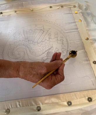 Someone creating a batik piece - Beautiful Batik