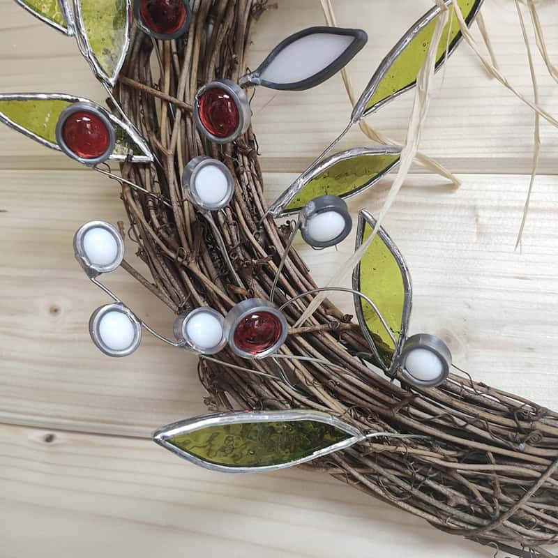A photo of a stained glass wreath - Stained Glass Autumn Flower Wreath