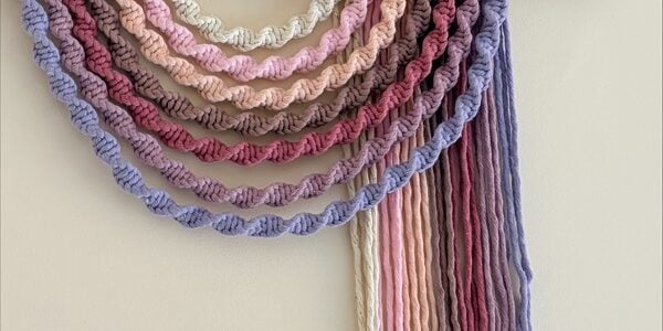 A macrame rainbow hanging - Macrame rainbows