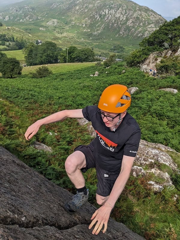 An image of a young person climbing - Adventure+ Camp
