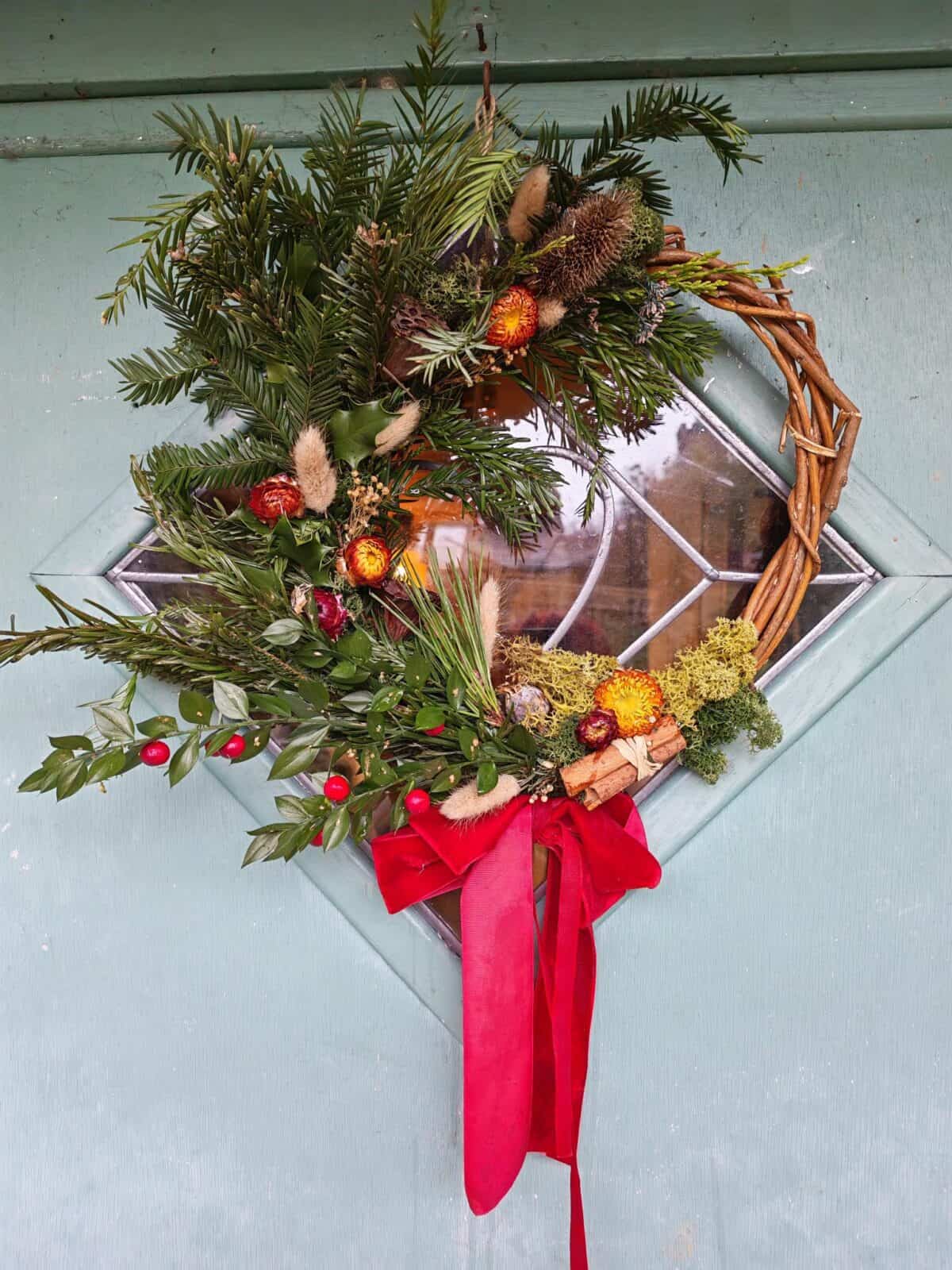 A photo of a Christmas wreath made from natural foliage - Christmas Wreath Making Workshop