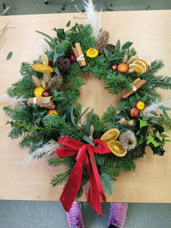 A photo of a Christmas wreath made from natural foliage - Christmas Wreath Making Workshop